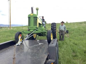 My grandpa helping me load the 630