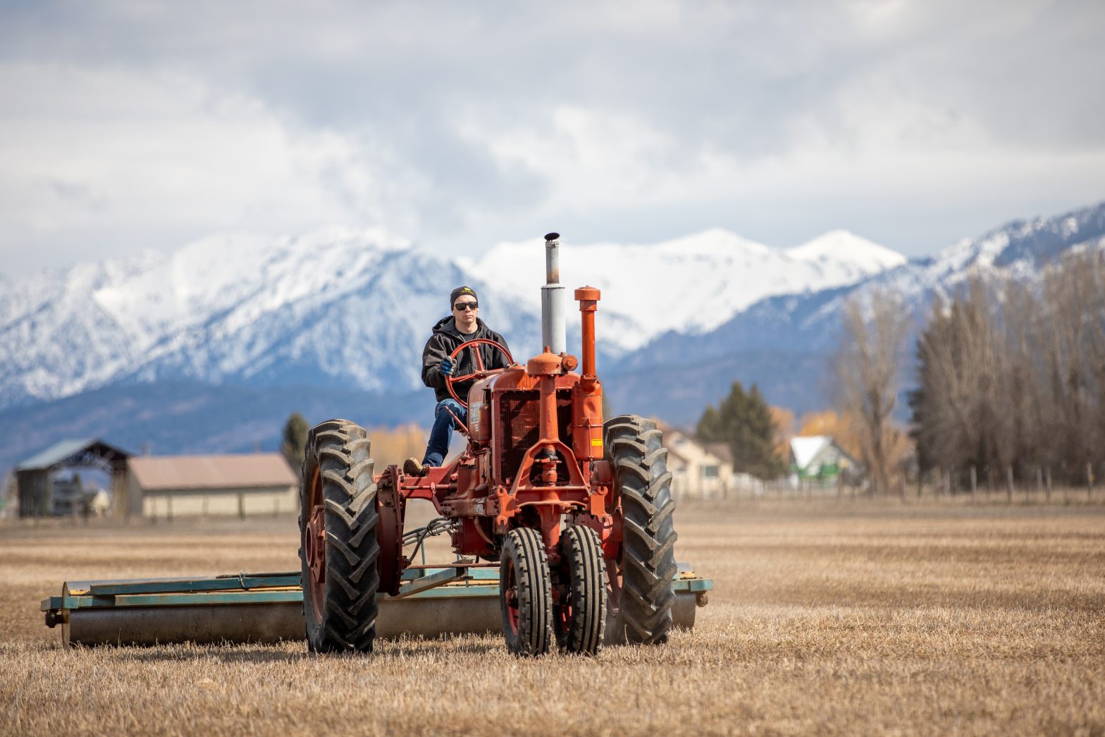 Farmall F-30 Pulling Roller with Mountains
